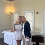 (PHOTO: Lilly Whaling receives her student-athlete of the month certificate from Varsity Field Hockey Coach Kelly Vegliante.)