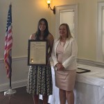 (PHOTO: Lions Club Athlete of the Year Ashley Kessner receives a proclamation from Westchester County Legislator Catherine Parker.)
