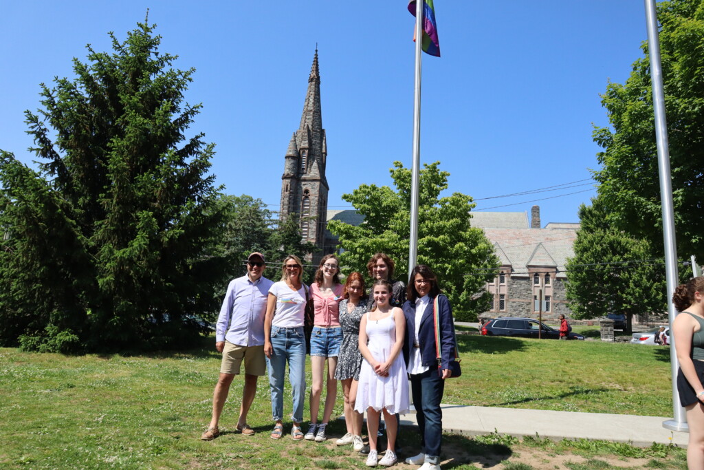 (PHOTO: On the Rye High School and Middle School campus (from left to right): Josh Nathan, Amanda Timchack, Shannon Haines, Jos White, Haley Kloepfer, Odessa Meulbroek (back), and Lori Fontanes. Credit: Sierra Desai.)