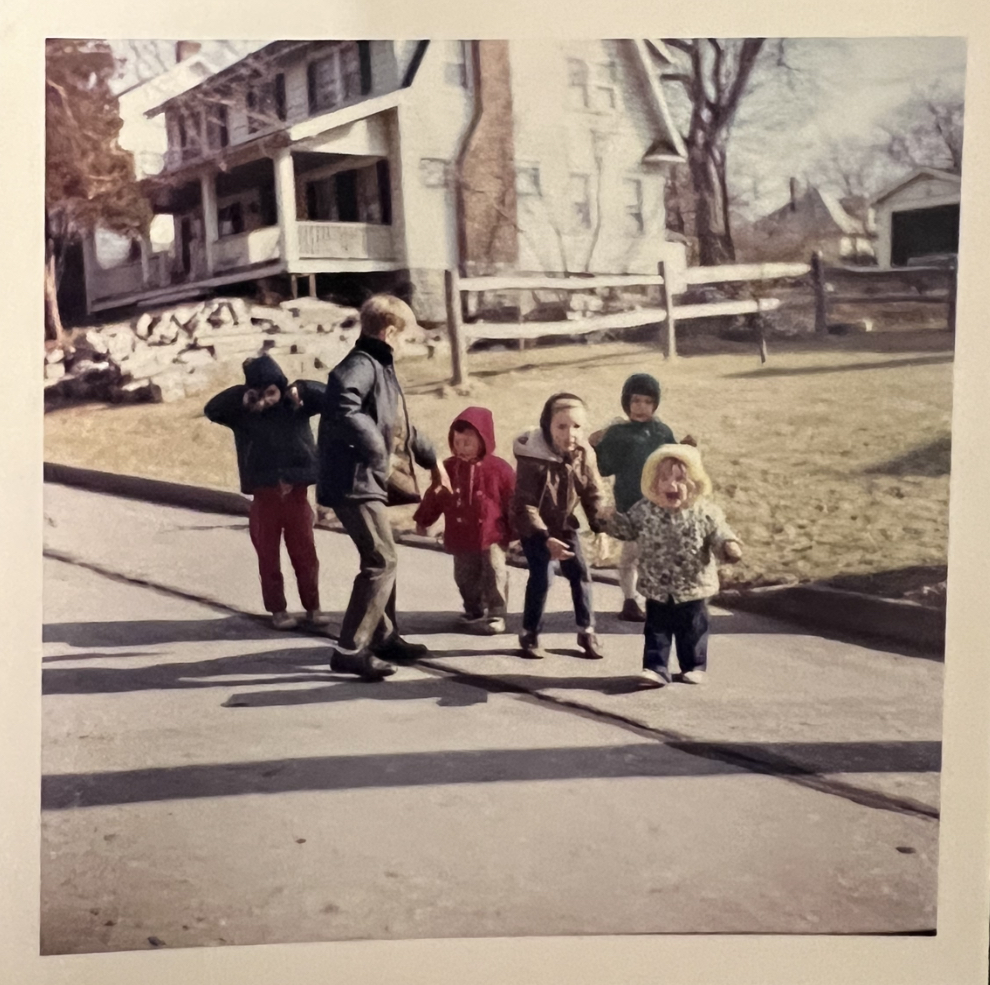 (PHOTO: Dorothy Lee, Sally Lee's daughter, playing with neighborhood friends on Mead Place in 1969.)