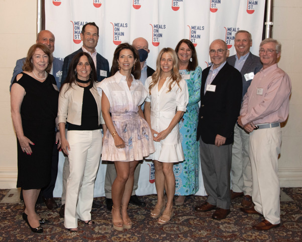 (PHOTO: Meals on Main Street's Board of Directors: (front row) Pat Hart, Amy Hirschhorn, Michele Allison, and Nicole Gibbs; (second row) Anthony Tirone, Michael Dailey, Terence Linehan, Jane O’Sullivan, Samuel Dimon, Barry Mitchell, and James Egan)