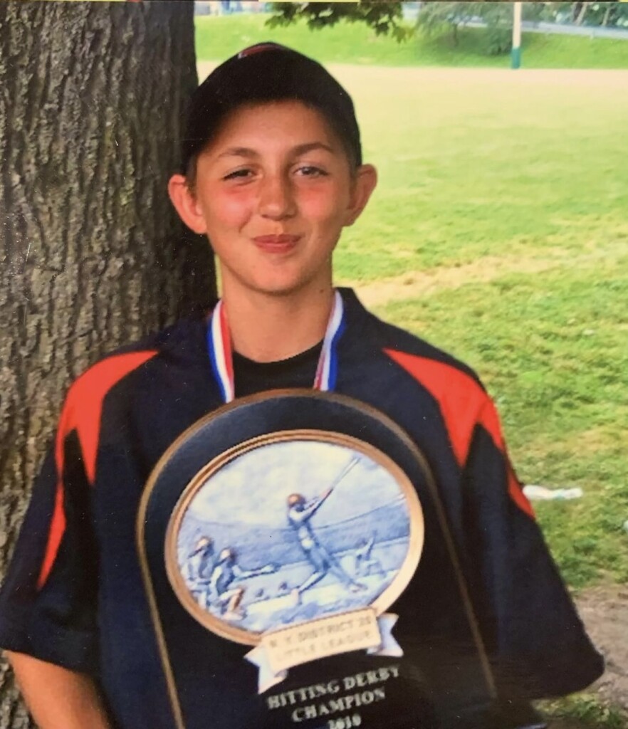 (PHOTO: George Kirby in 2010 holding up his trophy from the Hitting Derby during his time playing for the Rye Little League.)