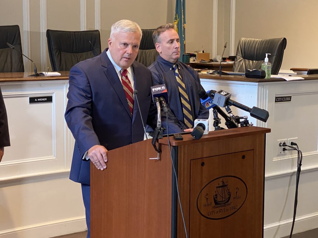 (PHOTO: City of Rye Public Safety Commissioner Mike Kopy at the PD briefing on the Rye Town Park assault held June 26, 2023 at Rye City Hall. Behind Kopy is Detective Mike Anfuso.)