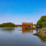 (PHOTO: The iconic red Tide Mill house, part of the Tide Mill Yacht basin. Credit: Sierra Desai.)