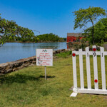 (PHOTO: The iconic red Tide Mill house, part of the Tide Mill Yacht basin. Credit: Sierra Desai.)