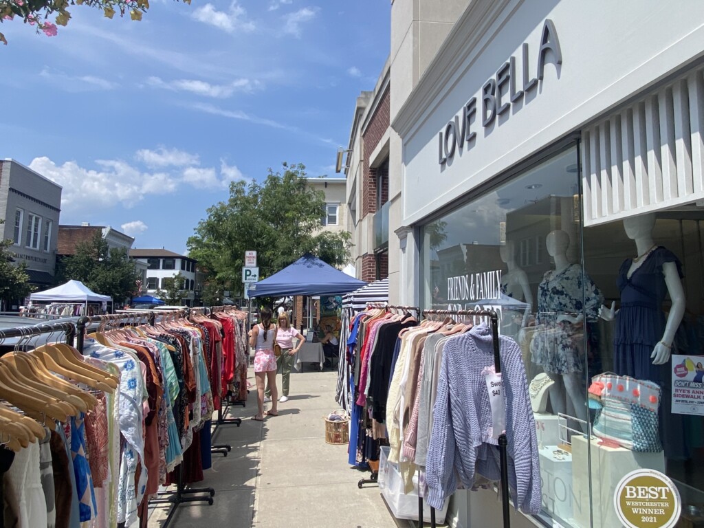 (PHOTO: Rye's 2023 annual sidewalk sale got underway on Thursday. Along downtown Purchase Street the sale continues 10:00am - 5:00pm on Friday, July 21st and Saturday, July 22nd.)