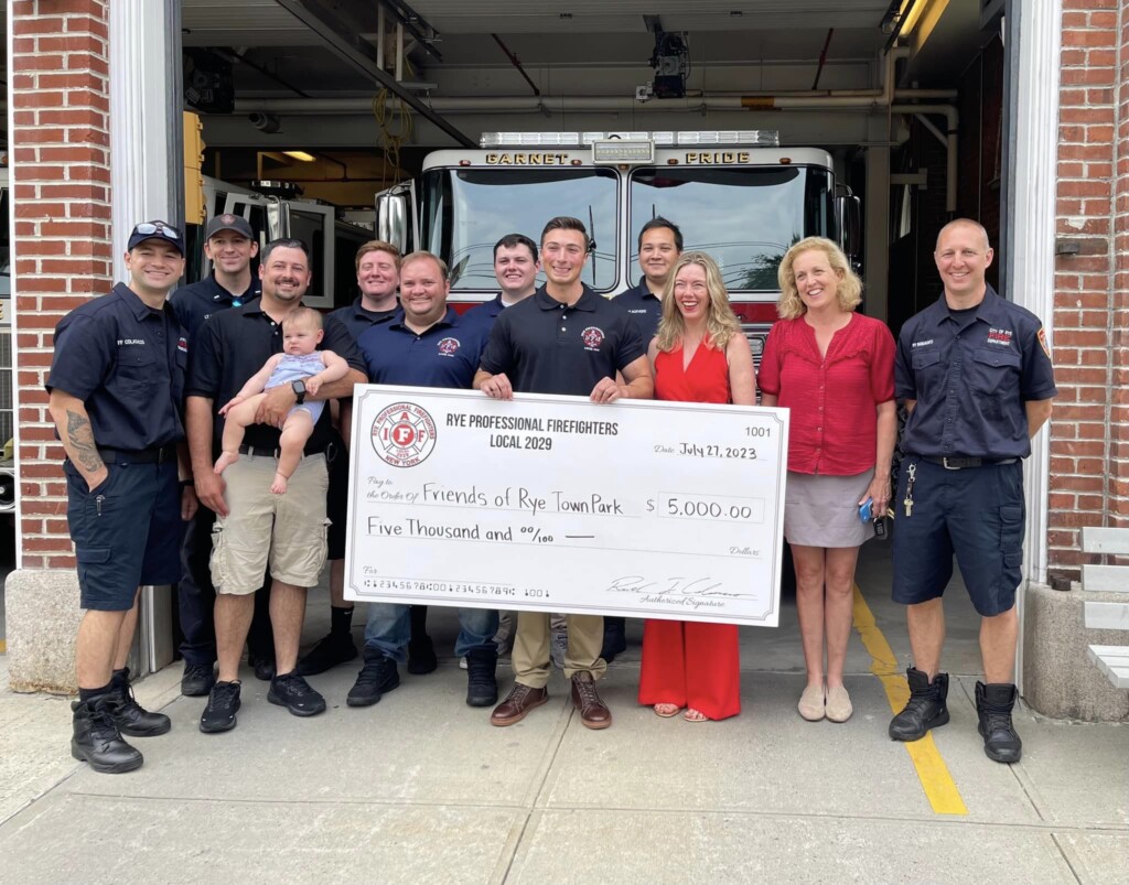 (PHOTO: Rye Professional Firefighters Local 2029 presented $5,000 to Diana Page and Jamie Jensen of Friends of Rye Town Park.)