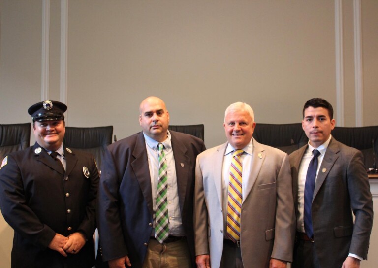 (PHOTO: The City of Rye Department of Public Safety announced three promotions across the PD and FD on Tuesday, August 29, 2023. With their new titles (left to right): Rye FD Lieutenant Max Billington, Rye PD Sergeant Michael Anderson, Rye Public Safety Commissioner Michael Kopy (who announced the promotions) and Rye PD Detective Chris Salguero.)