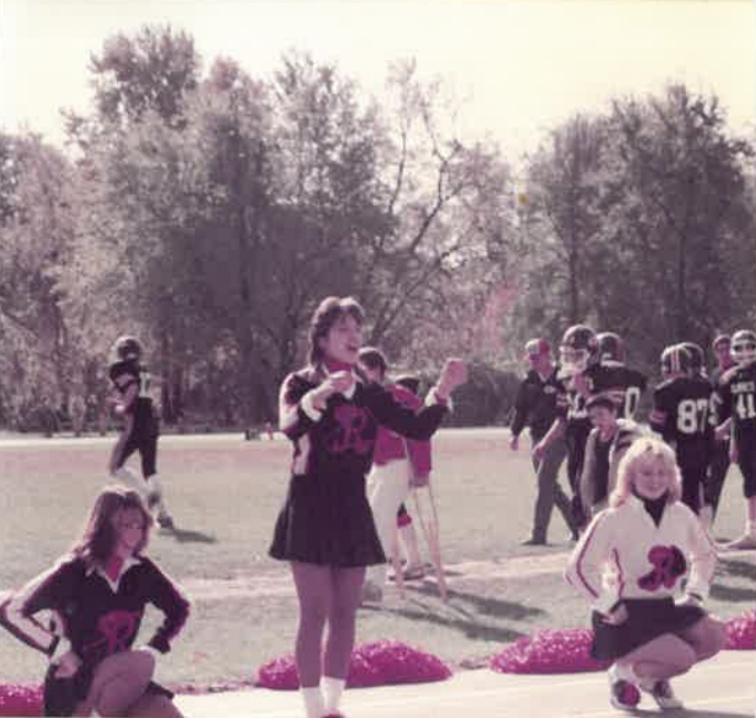 (PHOTO: Adriane cheerleading on Rye Garnets Football Field, Fall 1984)