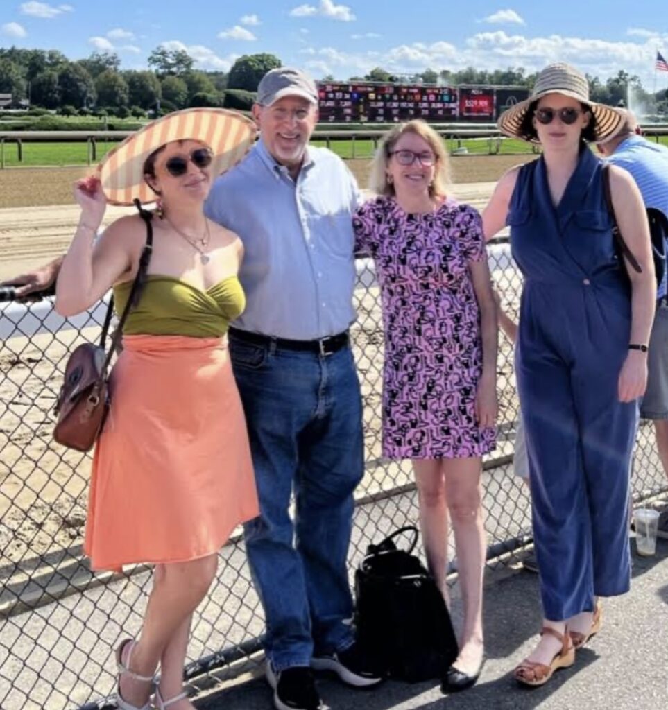 (PHOTO: Pamela Ruben Golum, the Rye High School Class of 1974 (second from right), with her husband Rob and their two daughters Caroline and Jennifer.)
