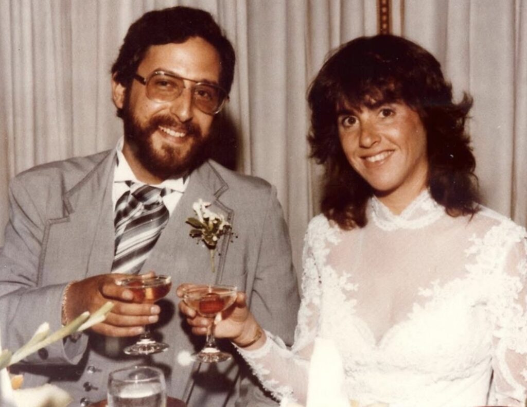 (PHOTO: Pamela Ruben Golum, the Rye High School Class of 1974, with her husband Rob at their wedding.)