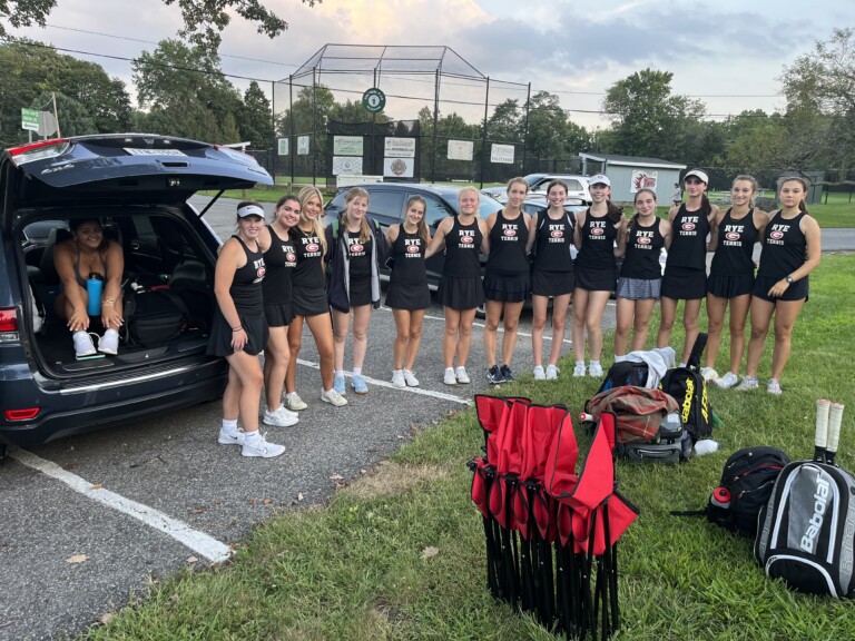 (PHOTO: The Rye Girls Varsity 1 team poses in celebration of their season opening home victory on Tuesday, September 12, 2023 against New Ro.)