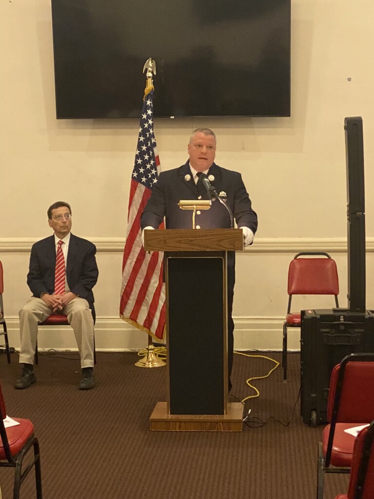 (PHOTO: Lieutenant Clyde Pitts of Rye FD read the names of those from Rye lost at the City of Rye 9-11 Commemoration Ceremony on Monday, September 11, 2023 at the Rye Locust Avenue firehouse.)