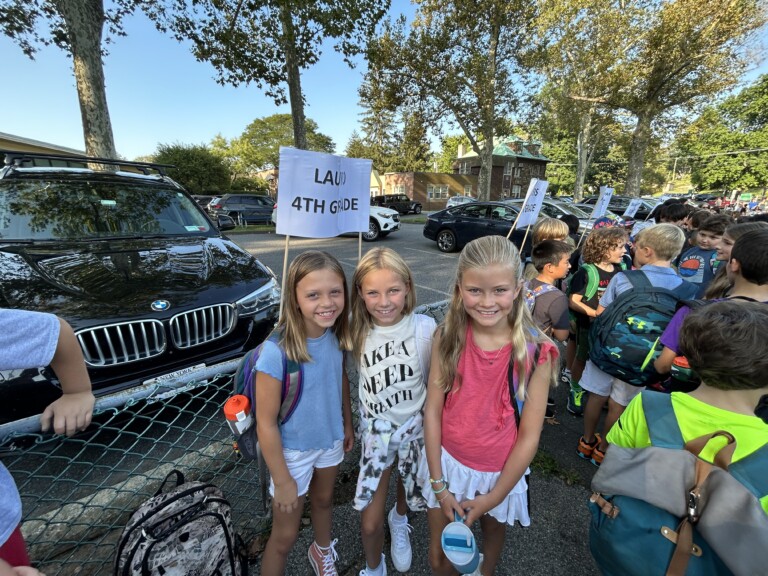 (PHOTO: Midland Elementary 4th graders Daphne Berkoff, Bayley Yaeger and Caroline Asgeirsson ready to go on day one.)