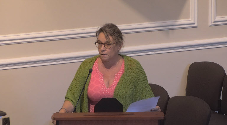 (PHOTO: Garden Drive resident Suki van Dijk speaking at the Rye City Council meeting on Wednesday, September 13, 2023.)