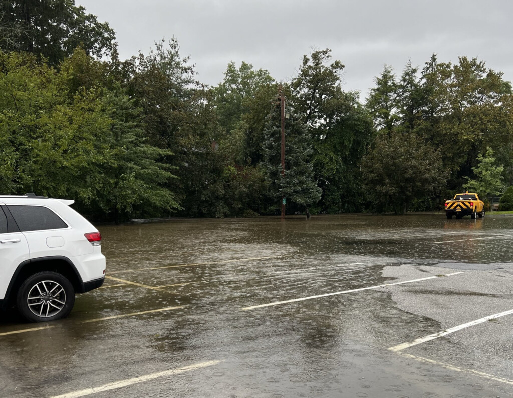 (PHOTO: The Highland Road parking lot, adjacent to the Blind Brook, was flooding mid-day Friday, September 29, 2023.)