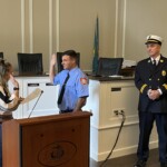 (PHOTO: New Rye Fire Fighter Brandon Antolino was sworn in by Deputy City Clerk Kayla Garritano on Tuesday, September 26, 2023. Captain John McDwyer is on the right.)