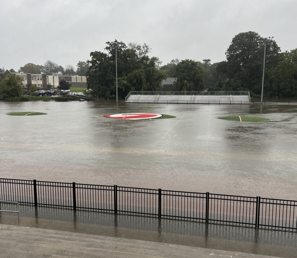 (PHOTO: The turf field at Rye High School flooded from the Blind Brook, around 11:30am on Friday, September 29, 2023.)
