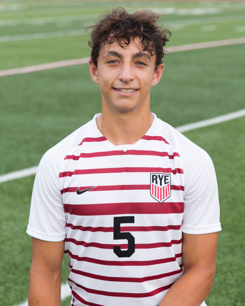 (PHOTO: Rye Boys Varsity Soccer player Chase Pepper (#5) contributed an assist on a Charlie Margiloff goal in the 37th minute versus Woodlands on Tuesday, September 26, 2023. Credit: Aileen Brown.)