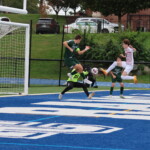 (PHOTO: At Rye Boys Varsity Soccer on Saturday versus Yorktown, Liam Harrington connected on a corner kick but it was saved by Yorktown's Jozef Popo. Credit: Alvar Lee.)