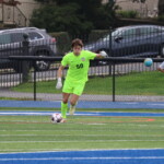 (PHOTO: At Rye Boys Varsity Soccer on Saturday versus Yorktown, Max Crothall sent a pass up field. Credit: Alvar Lee.)