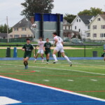 (PHOTO: At Rye Boys Varsity Soccer on Saturday versus Yorktown, Tommy Broderick headed the game's first goal. Credit: Alvar Lee.)