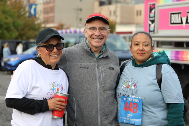 (PHOTO: At the 2023 annual Miles for MOMS (Meals of Main Street) race: Meals on Main Street’s (MOMS) Food Pantry Coordinator Irma Arango, with MOMS Board President and long-time Rye resident Sam Dimon, and MOMS staff member Didi Arroyo.)