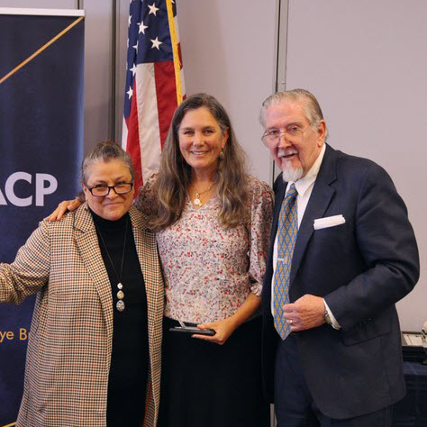 (PHOTO: Branch Secretary Nancy Pasquale of the Port Chester-Rye branch of the NAACP, Freedom Fund luncheon honoree awardee Alison Cupp Relyea of the Rye Historical Society), and Tom Kissner, president of the branch.)