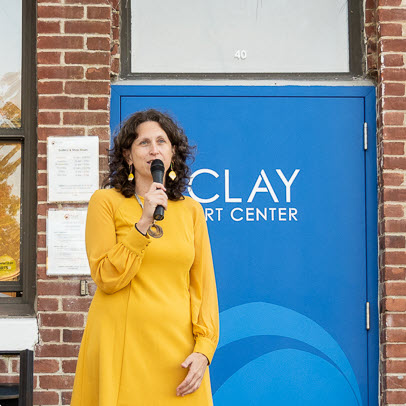 (PHOTO: Emily Peck, executive director of the Clay Art Center.)