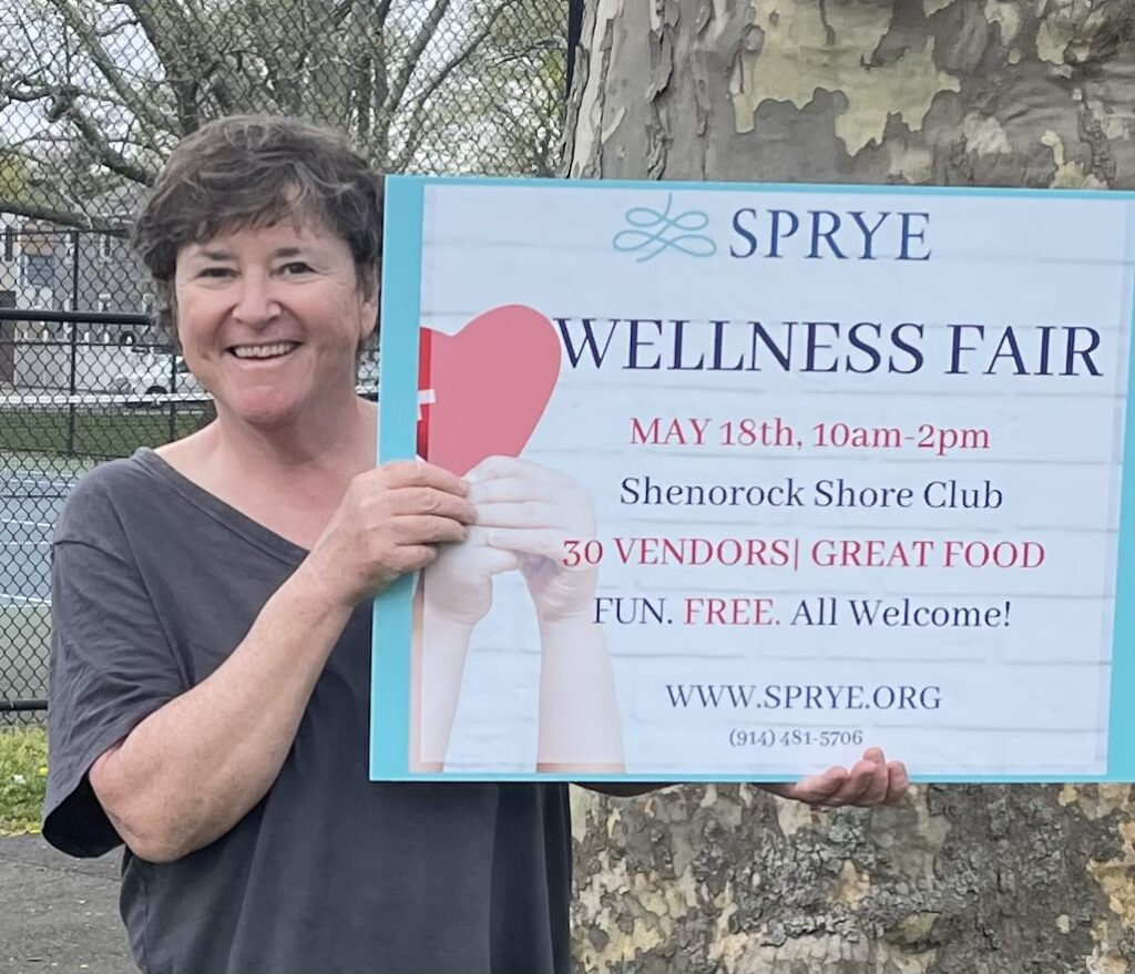 (PHOTO: Marie Johnson​ , executive director​ of SPRYE, at the wellness fair.)
