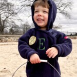 (PHOTO: One of Rye Town Park's regular beach cleanup volunteers, three year old Junior Rye Town Park Ranger Evan. Credit: Jaime Ulrich.)