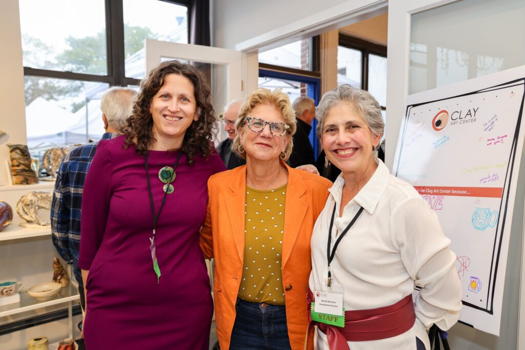 (PHOTO: Emily Peck, executive director of Clay Art Center with NYS Senator Shelley Mayer and Development Director Wendy Weinstein.)