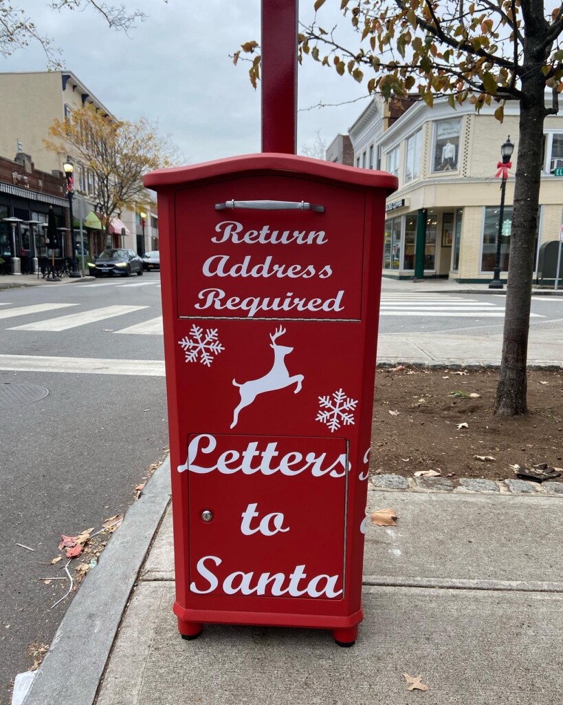 (PHOTO: This Santa mailbox at Purchase and Elm comes with a gift for parents: Anna Maria's Wine Bar just steps away.)