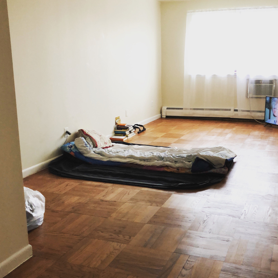 (PHOTO: Many clients of Furniture Sharehouse are living, sleeping and eating on the floor and living out of plastic bags because they lack the financial means to buy furnishings.)