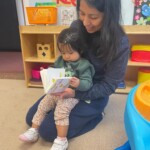 (PHOTO: Ana C. - With Elena (child) reading together at All Souls Community Center in Port Chester, part of 5 Steps to Five programming, in fall 2023.)