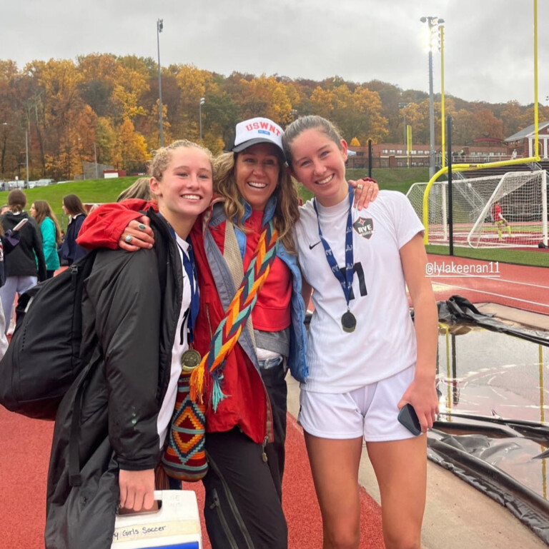 (PHOTO: Eve Lane resident and Rye Youth Soccer board member Emily Keenan with her two daughters after a Rye High School Girls Varsity Soccer game this year. The team won the State Championship.)