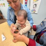 (PHOTO: Maria with Harleen (child) at All Souls Community Center in Port Chester planting for mother’s day, part of 5 Steps to Five programming, in May 2023.)