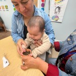 (PHOTO: Maria with Harleen (child) at All Souls Community Center in Port Chester planting for mother’s day, part of 5 Steps to Five programming, in May 2023.)