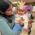 (PHOTO: Sisters Rianna and Aitana celebrating gratitude at All Souls Community Center in Port Chester, Thanksgiving 2023 as part of 5 Steps to Five programming.)