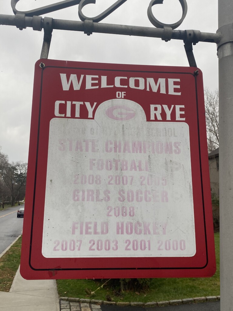 (PHOTO: Looks like this Welcome to the City Of Rye needs a Garnet football update.)