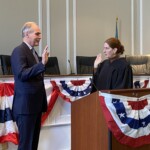 (PHOTO: New Councilmember Keith Cunningham being sworn in by Judge Valerie Livingston at the City of Rye Inauguration Ceremony on Monday, January 1, 2024.)