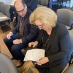 (PHOTO: Councilmembers make it official by signing paperwork from Judge Valerie Livingston at the City of Rye Inauguration Ceremony on Monday, January 1, 2024.)