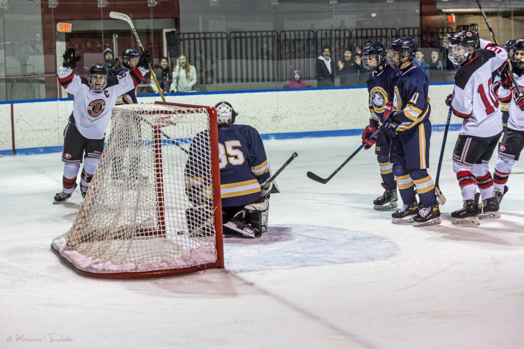 (PHOTO: Rye Boys Varsity Hockey player Lucas Tsuchida knits the game at 5 on Friday versus Rye Country Day.)