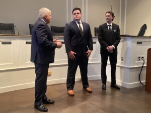 (PHOTO: Public Safety Commissioner Mike Kopy speaking just after new Rye FD Firefighters Aidan Ahearn and Thomas Junior were sworn in at a Rye City Hall ceremony on Wednesday, February 28, 2024.)