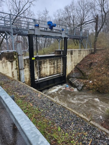 (PHOTOS: Flood waters at Bowman dam on Saturday, March 23, 2024.)