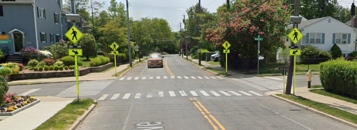 (PHOTO: Rectangular Rapid Flashing Beacons and signage striping installed at the intersection of Forest Avenue and Dearborn Avenue.)