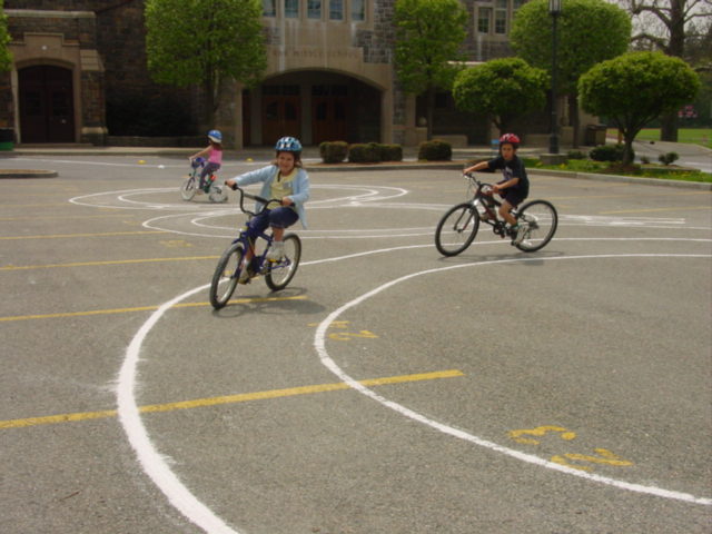 (PHOTO: The Traffic and Pedestrian Safety Committee has conducted bike rodeos like this one to teach children about bicycle safety.)