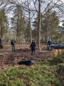 (PHOTO: Rye Sustainability Chair James Ward and Co-Chair Donna Providenti hand-raking the leaves and winter debris at the Bird Homestead & Meeting House Conservancy on April 13, 2024.)