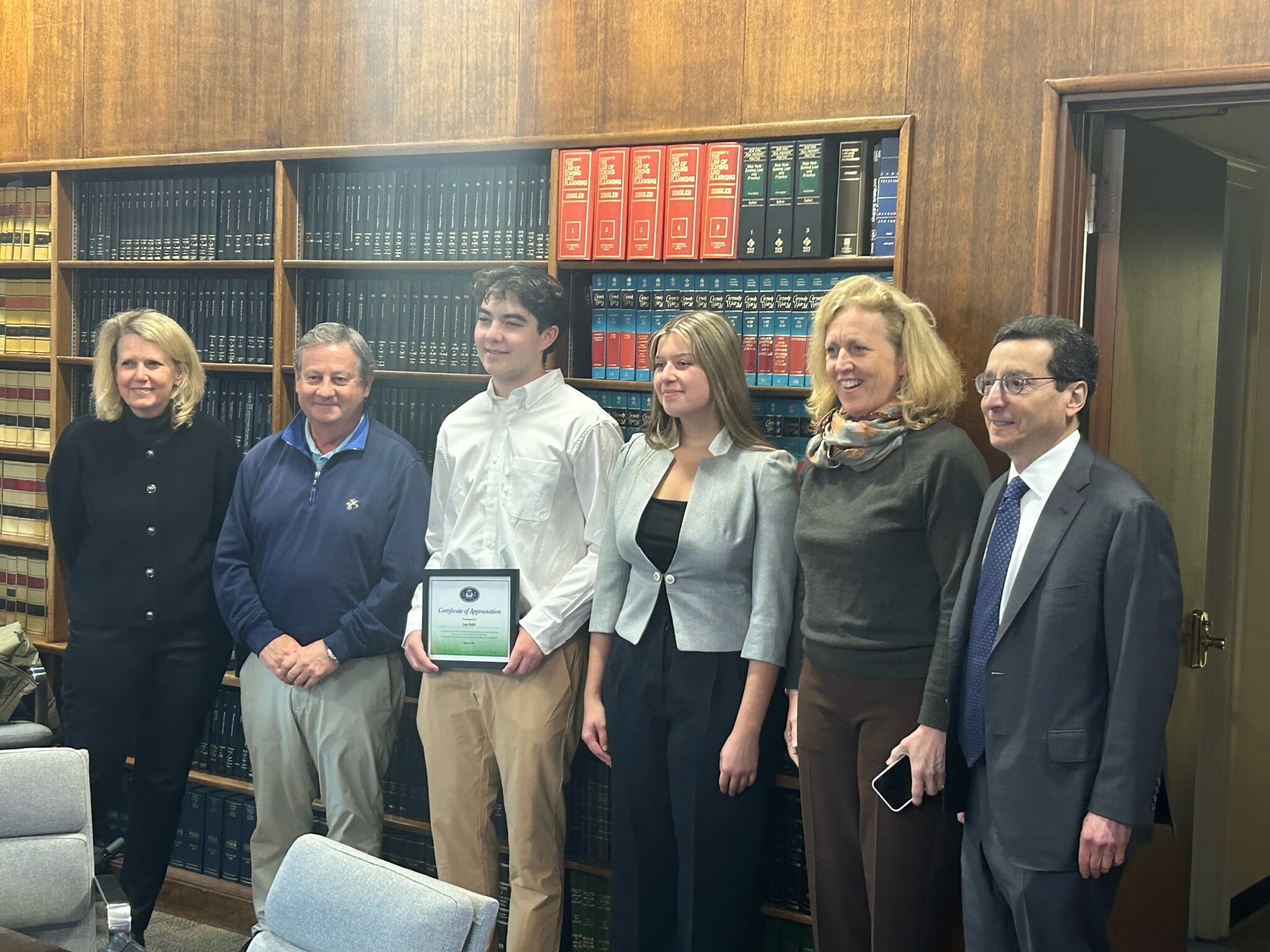 (PHOTO: The April 2, 2024 Rye City Hall ceremony for the 2024-2025 Junior CC/AC Commissioner, Ella Froah and 2023-2024 Junior Commissioner Leo Roth with Chair Tracy Stora, Mayor Josh Cohn and Councilmembers Bill Henderson and Jamie Jensen.)