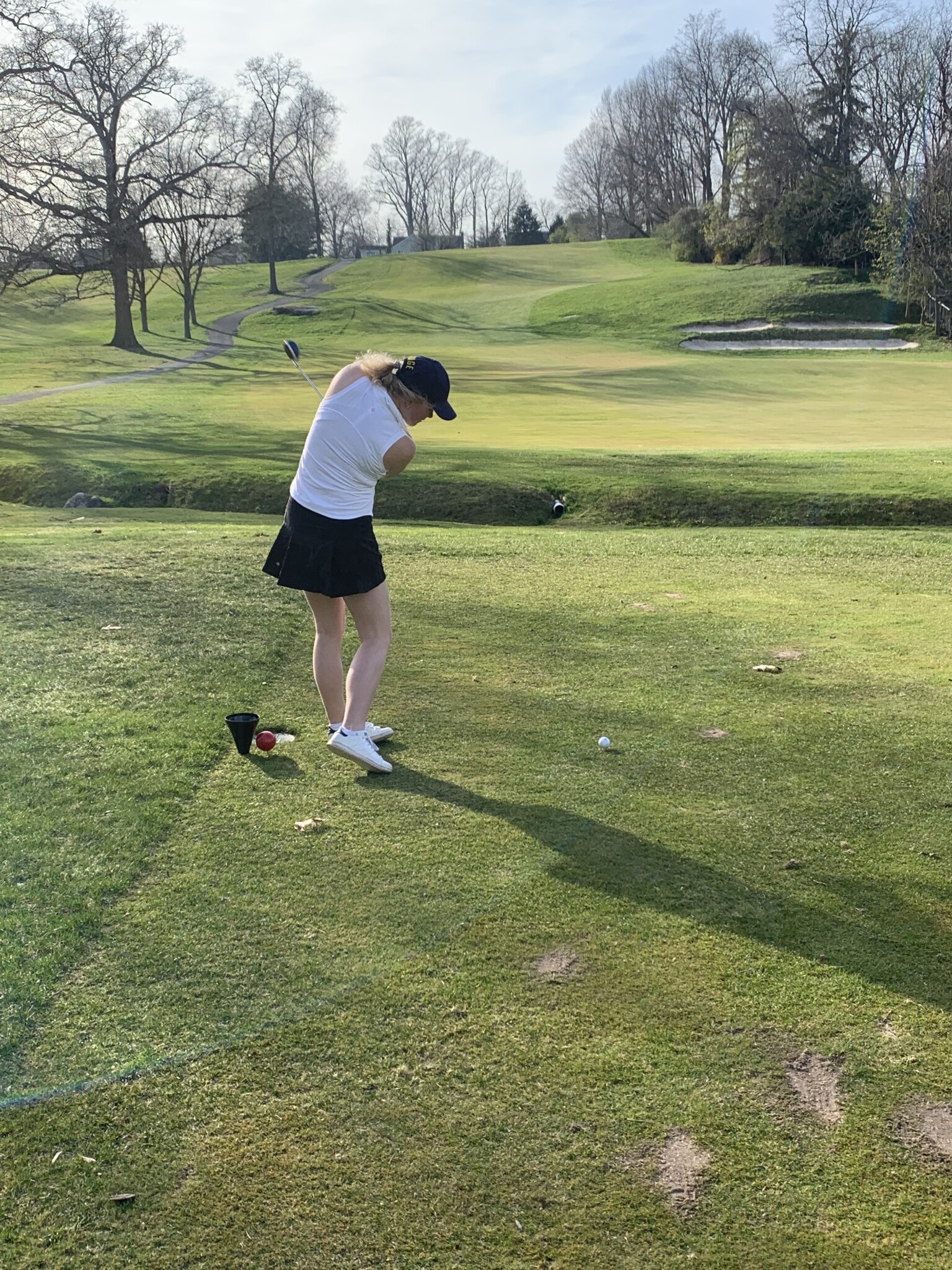 (PHOTO: Matilda Glitterstam teeing off on Tuesday when the Rye Girls Varsity Golf team faced Bronxville at Rye Golf Club.)